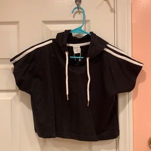 Black crop top with hood and white stripes on the shoulders